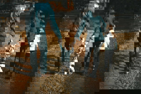 family with young children walking