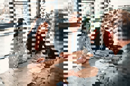 a couple meeting with their lawyer